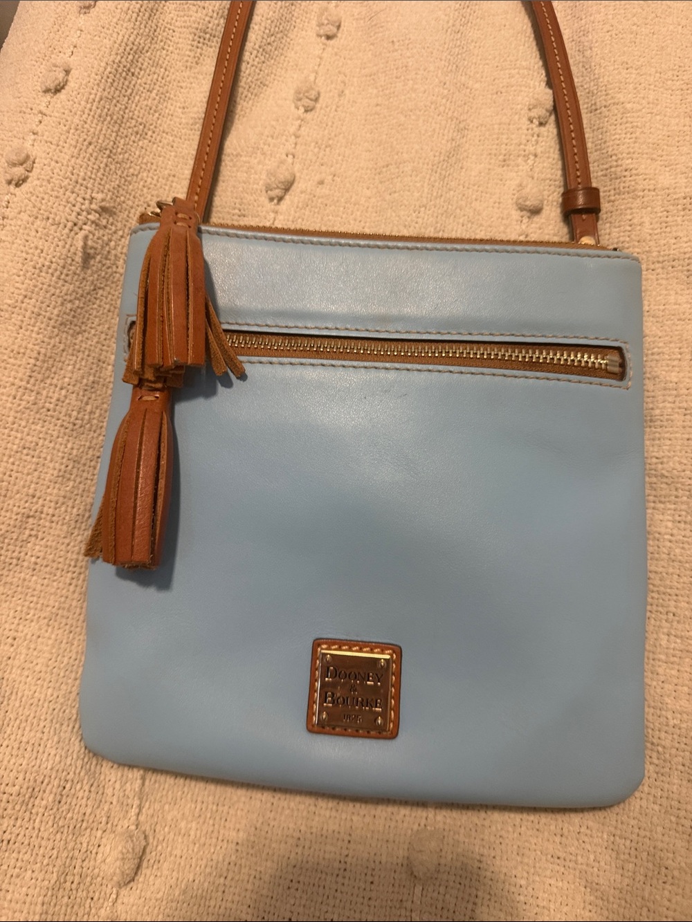 Dooney & Bourke Light Blue Leather Crossbody with Brown Trim and Tassel